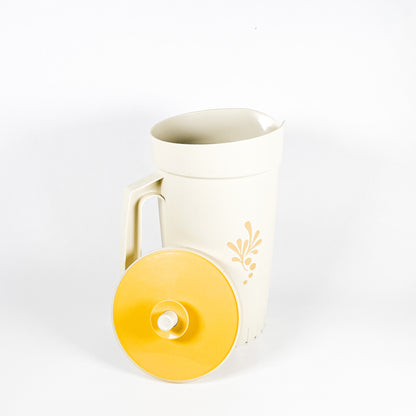 Beige Tupperware pitcher