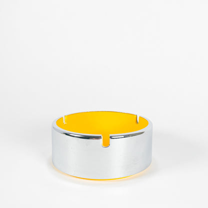 Silver and yellow ashtray dish