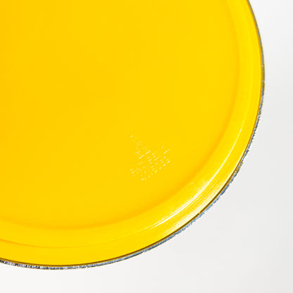 Silver and yellow ashtray dish