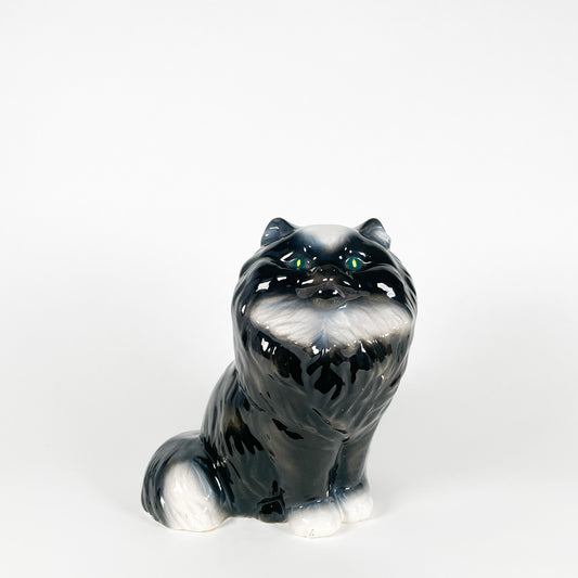 Black and white ceramic fluffy cat