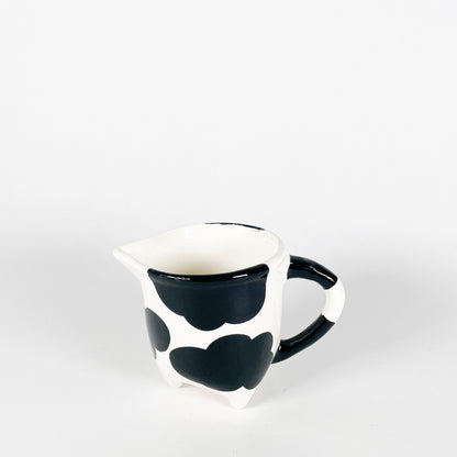 Cow udder creamer