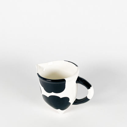 Cow udder creamer