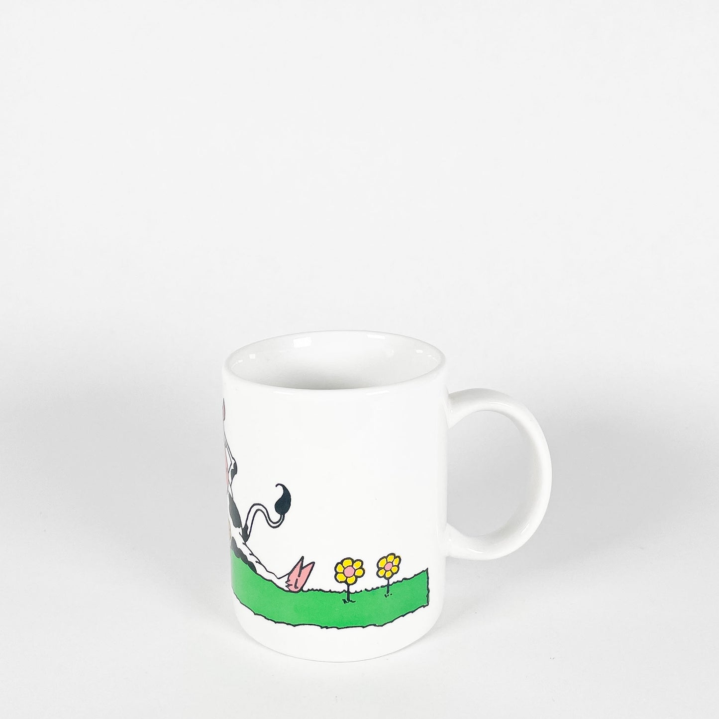 Cow in the meadow mug