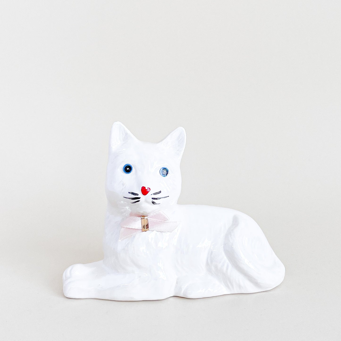 Iridescent white cat