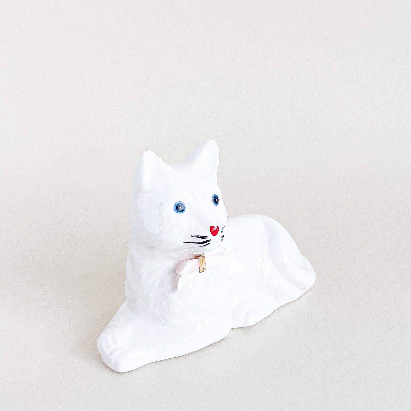 Iridescent white cat